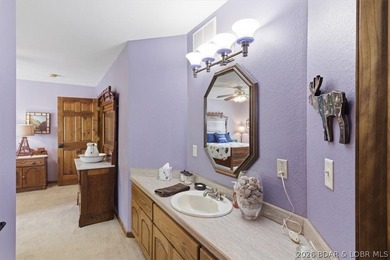 Vaulted ceilings, walls of windows, and wood-burning fireplace - photo 44