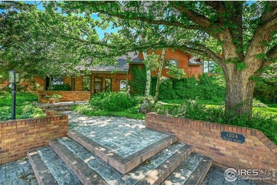 This exceptional custom home sits directly across from the - photo 2