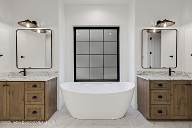This custom home in Teton Reserve offers a unique plan with - photo 21