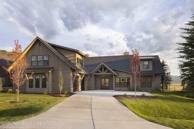This custom home in Teton Reserve offers a unique plan with - photo 40