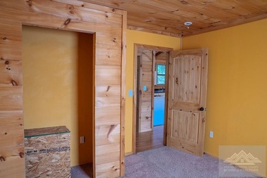 This is a 2 bedroom 1 full bath cabin with natural gas heat pump - photo 14