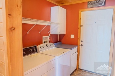 This is a 2 bedroom 1 full bath cabin with natural gas heat pump - photo 17