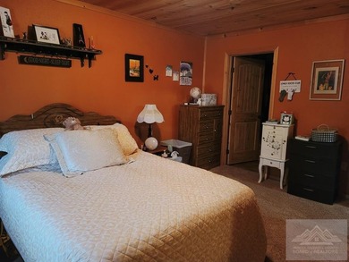 This is a 2 bedroom 1 full bath cabin with natural gas heat pump - photo 18