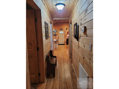 This is a 2 bedroom 1 full bath cabin with natural gas heat pump - photo 22