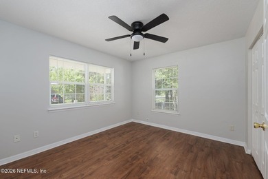 This charming cottage-style home with 3 beds + 2 baths is - photo 13