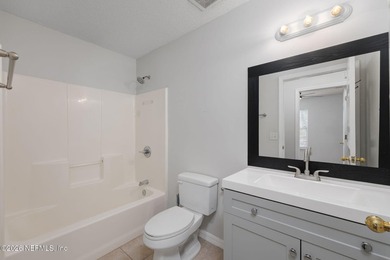 This charming cottage-style home with 3 beds + 2 baths is - photo 18