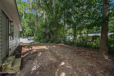 This charming cottage-style home with 3 beds + 2 baths is - photo 23
