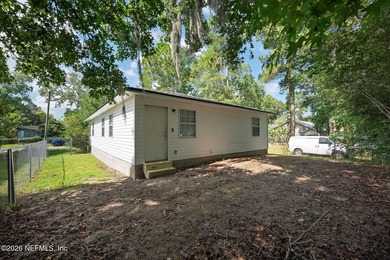 This charming cottage-style home with 3 beds + 2 baths is - photo 24