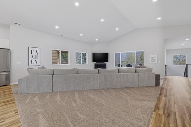 This contemporary home is on a half acre lot surrounded by - photo 7