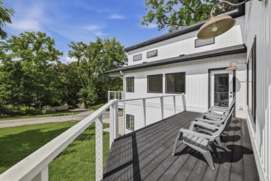 This contemporary home is on a half acre lot surrounded by - photo 9
