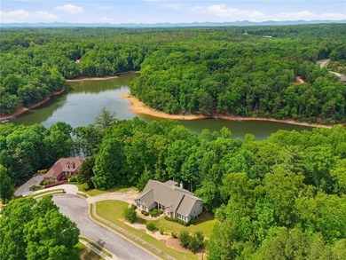 BEAUTIFUL CUSTOM LAKE HOME! Experience peaceful lake living in - photo 2