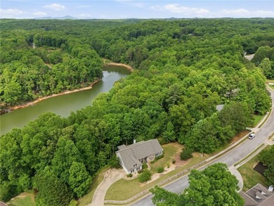 BEAUTIFUL CUSTOM LAKE HOME! Experience peaceful lake living in - photo 3
