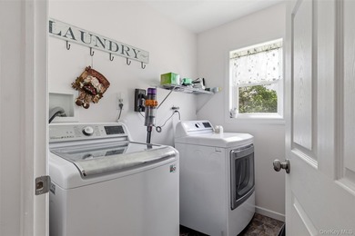 A Barnum Island beauty. This 3 Bdrm 2 Full Bath dormered raised - photo 12
