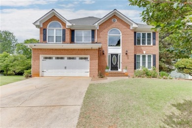 Lake Home For Sale in Flowery Branch, Georgia