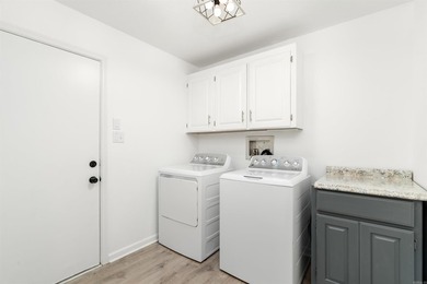 This home has been totally rebuilt...NEW roof, NEW electrical - photo 30