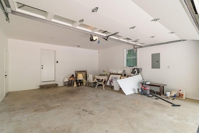This home has been totally rebuilt...NEW roof, NEW electrical - photo 31
