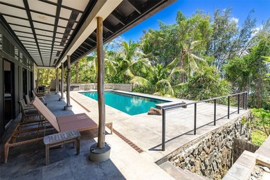 Perched along a vibrant coastal landscape, this private 3bed - photo 20