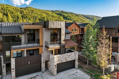 Perfectly positioned at Keystone's River Run Village, this - photo 1