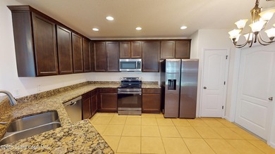 Live the coastal resort lifestyle in this beautifully updated - photo 6