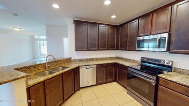 Live the coastal resort lifestyle in this beautifully updated - photo 7