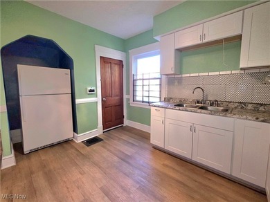 Welcome HOME to 9112 Parmelee Ave, in Cleveland! A charming and - photo 8