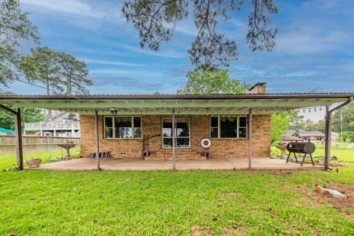 Charming Lakefront Retreat with Panoramic Water Views - Lake Home For Sale in Longview, Texas