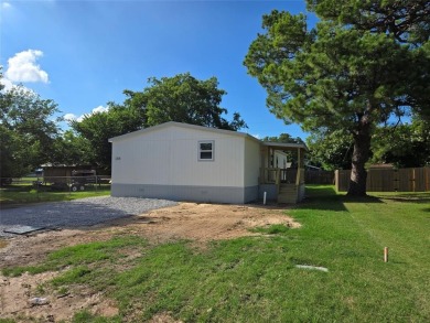 Lake Home For Sale in Pelican Bay, Texas