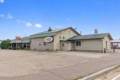Here's your chance to own a versatile commercial property in a - photo 1