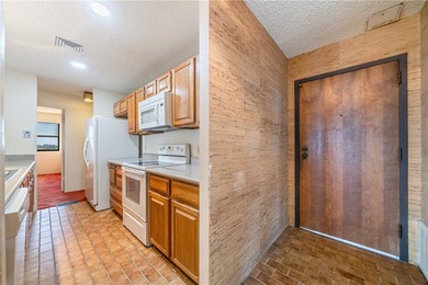 This 5th-floor corner unit offers exceptional views and