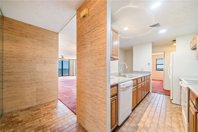 This 5th-floor corner unit offers exceptional views and