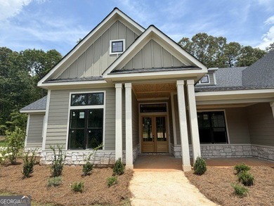 This adorable ranch plan features everything you need with - photo 3