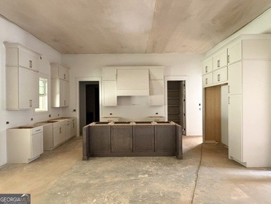 This adorable ranch plan features everything you need with - photo 4