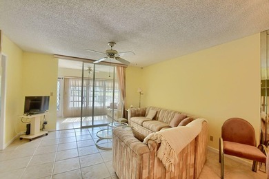 Discover serene lakefront living in this spacious 2/2 corner - photo 12