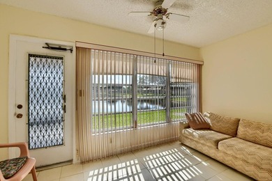 Discover serene lakefront living in this spacious 2/2 corner - photo 14