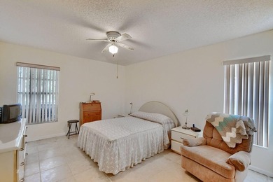 Discover serene lakefront living in this spacious 2/2 corner - photo 19