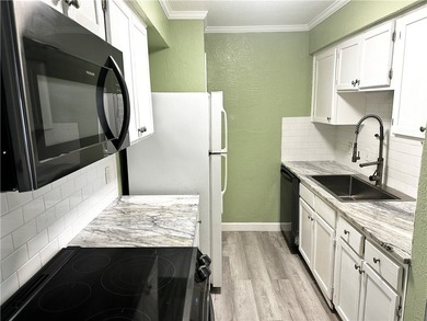 This remodeled second floor condo features, 2 bedrooms, 2 full - photo 4