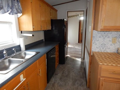 1986 Zimmer Duke mobile home in Fairview Estates 55+ community - photo 5