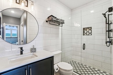 Experience elevated lakeside living in this stunning - photo 25
