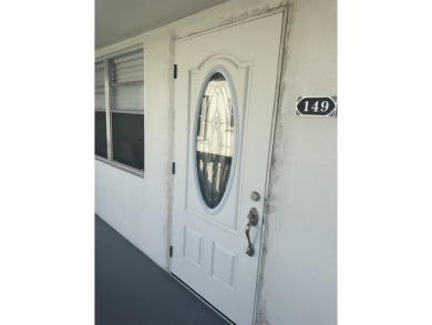 Century Village Lake Condo For Sale in West Palm Beach Florida