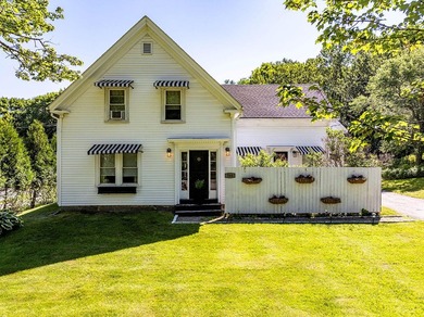 Thoughtfully and extensively renovated, this timeless farmhouse - photo 2