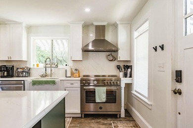 Thoughtfully and extensively renovated, this timeless farmhouse - photo 7