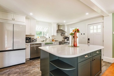 Thoughtfully and extensively renovated, this timeless farmhouse - photo 9
