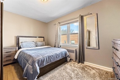 Welcome home to this inviting brick semi-attached single-family - photo 11