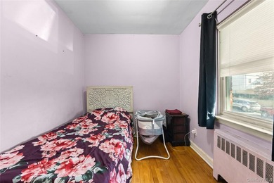 Welcome home to this inviting brick semi-attached single-family - photo 12