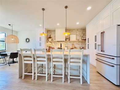 Welcome to an exceptional upgraded estate in the gated - photo 13