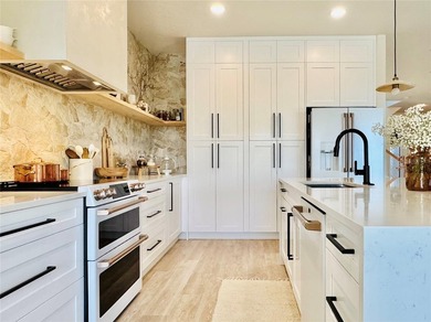 Welcome to an exceptional upgraded estate in the gated - photo 16