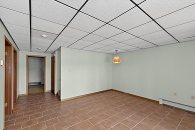This four-bedroom, two-bath, 2,116-square-foot two-story cabin - photo 22