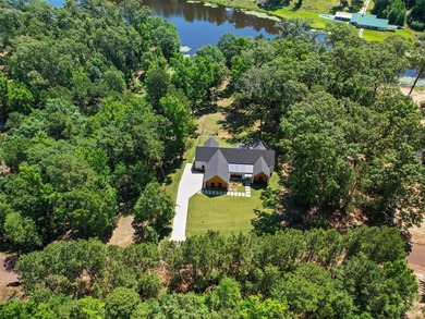 Experience peaceful waterfront living at this beautifully - photo 1