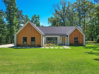 Experience peaceful waterfront living at this beautifully - photo 2