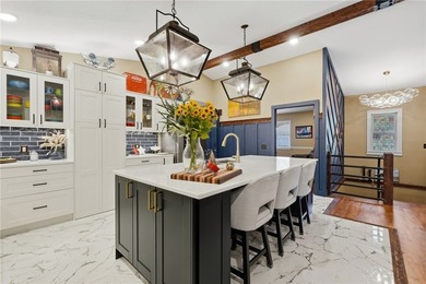 Completely remodeled with character, charm, & functionality in - photo 12